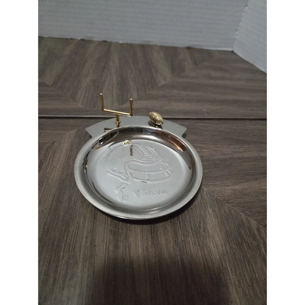 silver-tone and brass football 